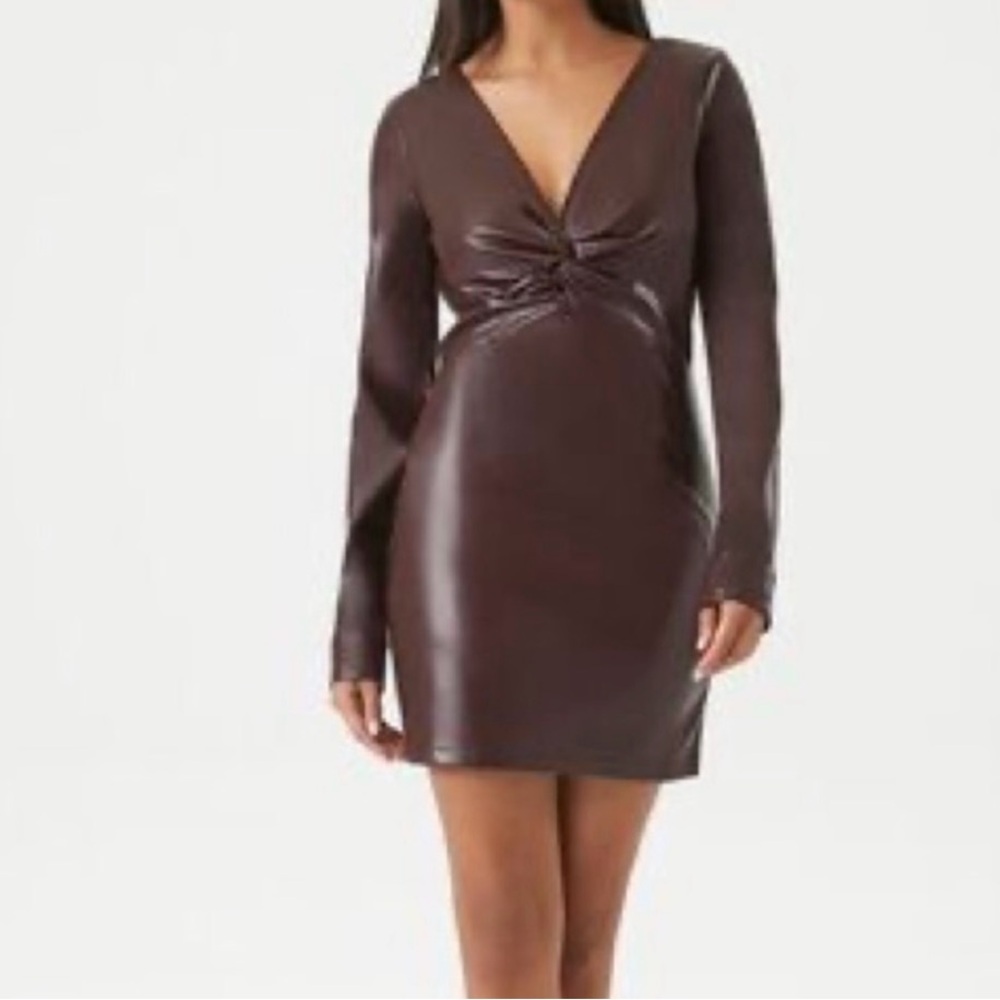 Women’s burgundy Medium dress faux leather, excellent condition. NWT